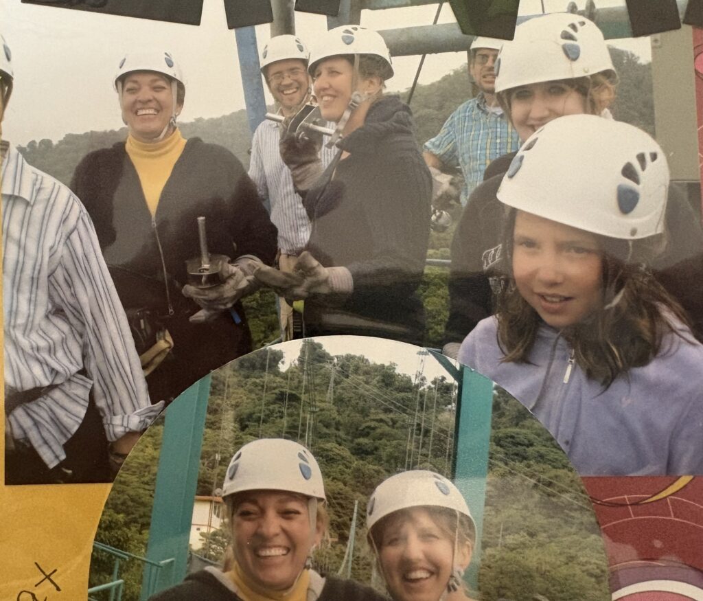 A group of seven people wait together at the top of a zipline in Costa Rica.